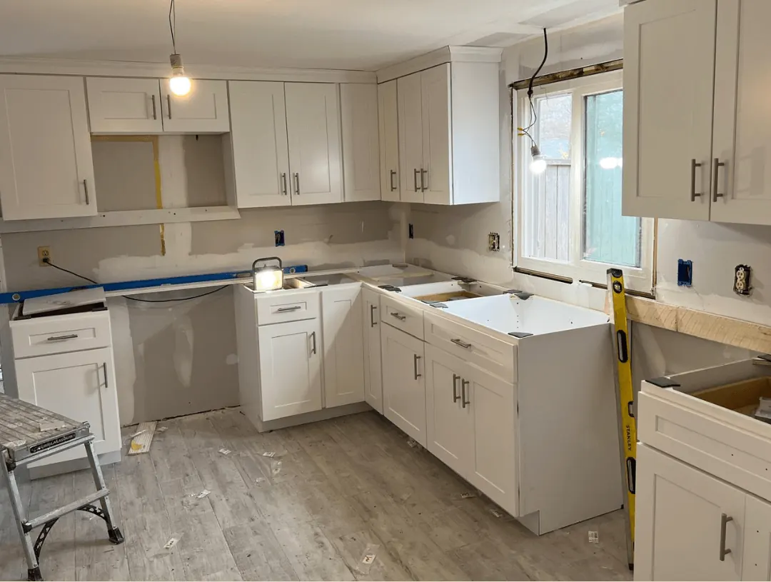 Kitchen during the remodel, cabinets set and counters not yet installed